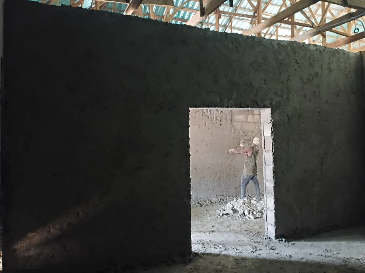 Internal plastered surfaces becoming complete. View 01.